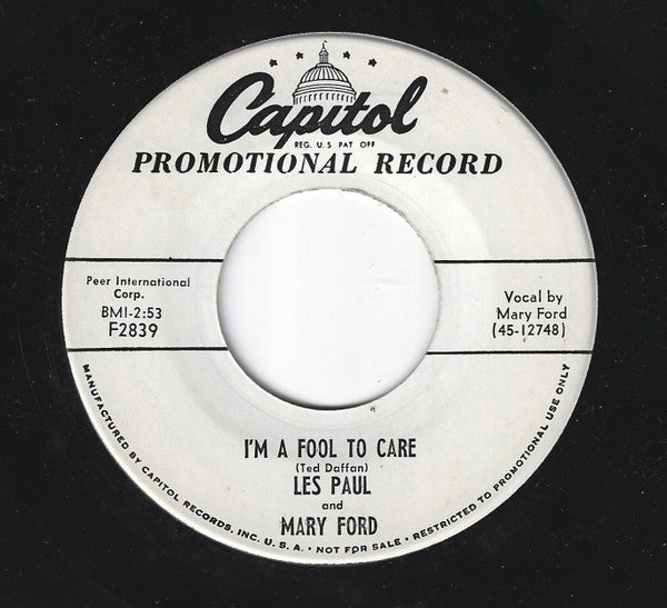 Les Paul And Mary Ford* : Auctioneer / I'm A Fool To Care (7", Single, Promo)