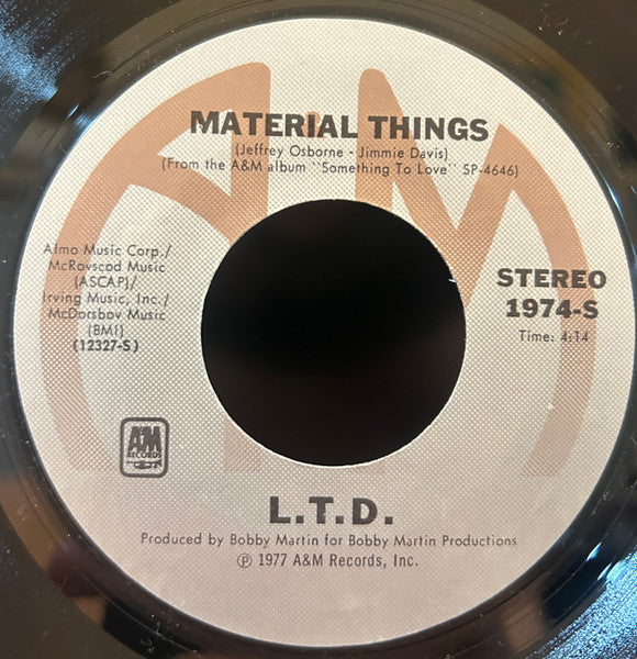 L.T.D. : (Every Time I Turn Around) Back In Love Again (7", Single)