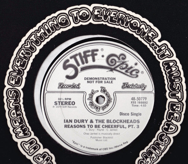 Ian Dury And The Blockheads : Reasons To Be Cheerful, Pt. 3 / Hit Me With Your Rhythm Stick (12", Single, Promo)