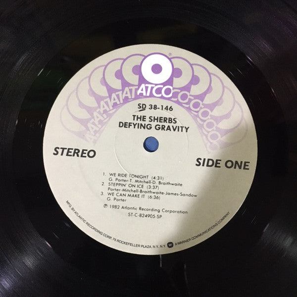 The Sherbs : Defying Gravity (LP, Album, Spe)