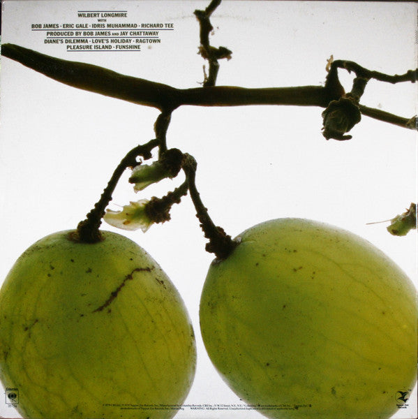 Wilbert Longmire : Champagne (LP, Album, Ter)