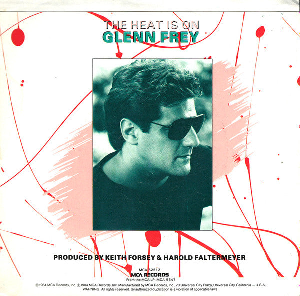Glenn Frey : The Heat Is On (7", Single, Pin)