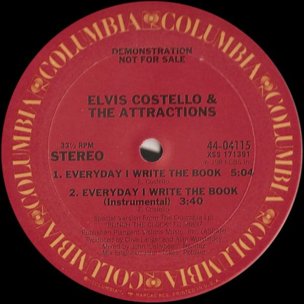 Elvis Costello & The Attractions : Everyday I Write The Book (12", Single, Promo, Pit)