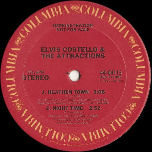Elvis Costello & The Attractions : Everyday I Write The Book (12", Single, Promo, Pit)