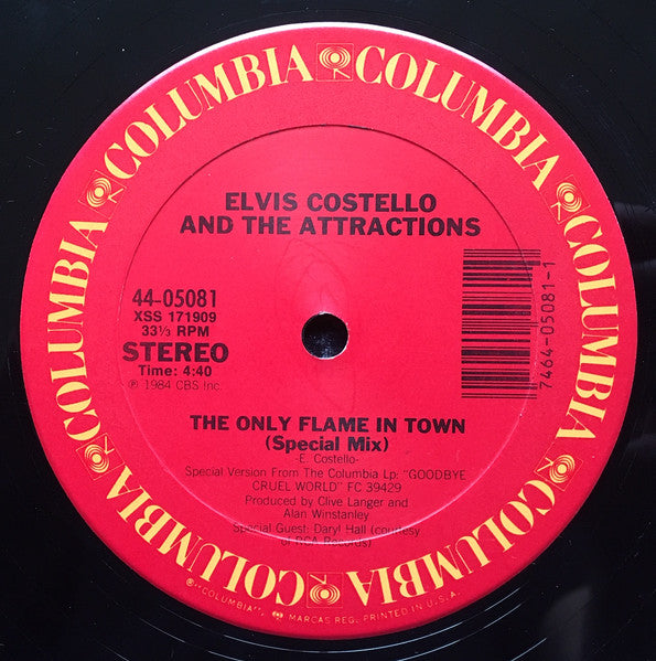 Elvis Costello & The Attractions : The Only Flame In Town (12", Single, Car)