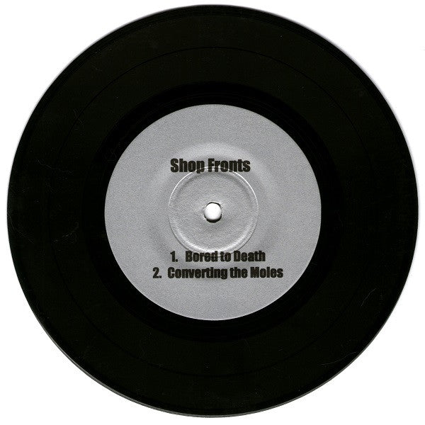 Shop Fronts / DC Snipers : This Is The DC Snipers Shop Fronts Split Single (7", EP)