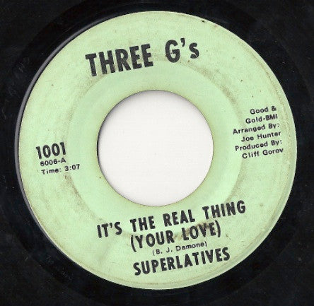 The Superlatives (3) : It's The Real Thing (Your Love) (7", Single)