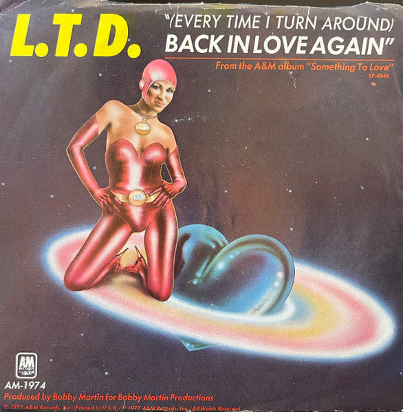 L.T.D. : (Every Time I Turn Around) Back In Love Again (7", Single)