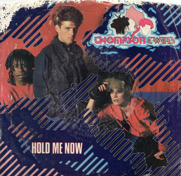 Thompson Twins : Hold Me Now (7", Single, Styrene, Ind)